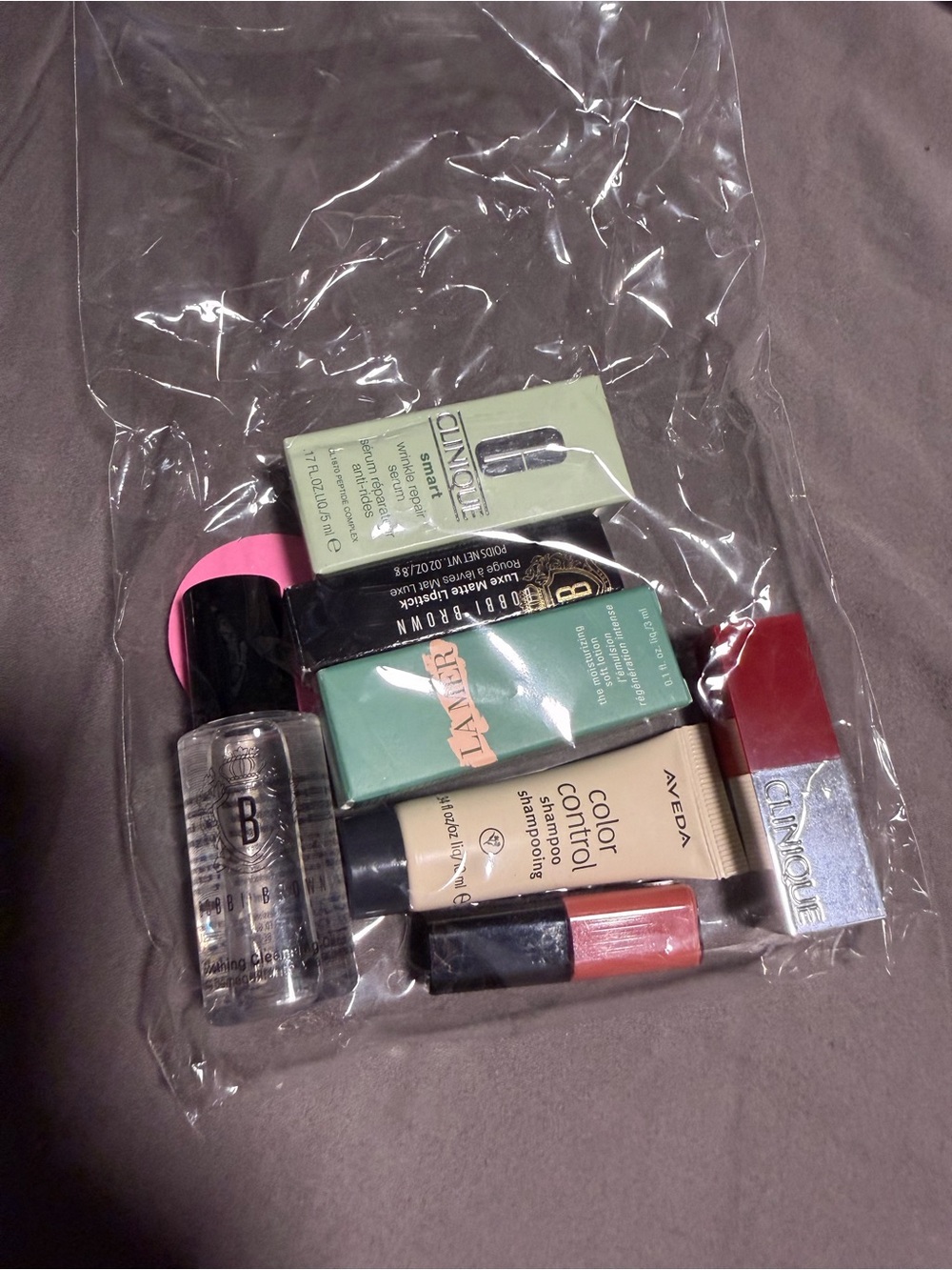 Clinique Mini Makeup & Skincare Set with Pink and Red Accents